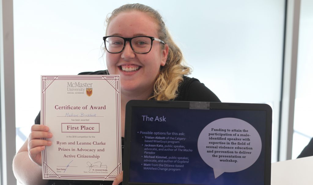 Fourth-year social work student Maddie Brockbank, shown here with her Clarke Prize for advocacy and citizenship, says the Office of Experiential Education has opened doors for her and helped her discover a new way to learn.