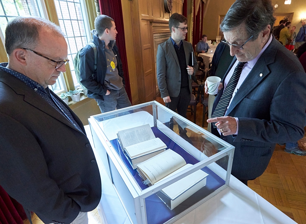 Bernard Linsky (right) looks at the corrected proofs which were on display during a recent event hosted by the Library that brought together members of McMaster’s Departments of Philosophy, and Mathematics and Statistics for a special celebration of Principia Mathematica.