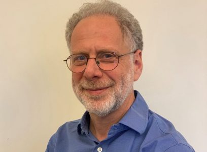 Headshot of a bearded man 