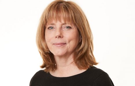 headshot of a woman smiling slightly