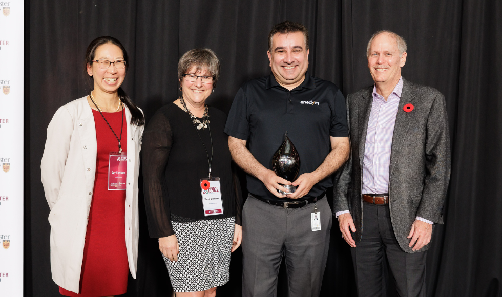 Ali Emadi is presented the Lifetime Innovator award by Gay Yuyitung, executive director of MILO, Karen Mossman, vice-president, research, and David Farrar, president. 