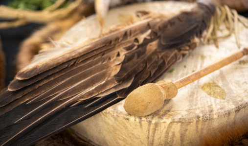 An eagle feather on a drum
