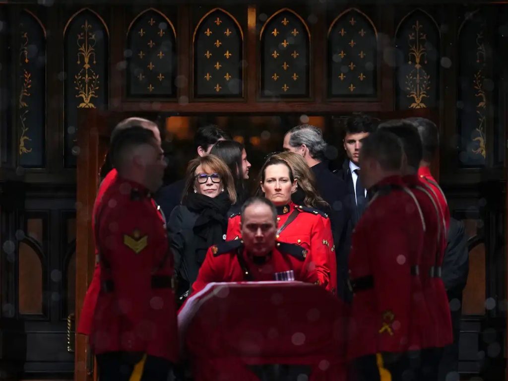 Mila Mulroney, centre left, follows RCMP pallbearers as they carry the casket out from the funeral of former prime minister Brian Mulroney. THE CANADIAN PRESS/Sean Kilpatrick