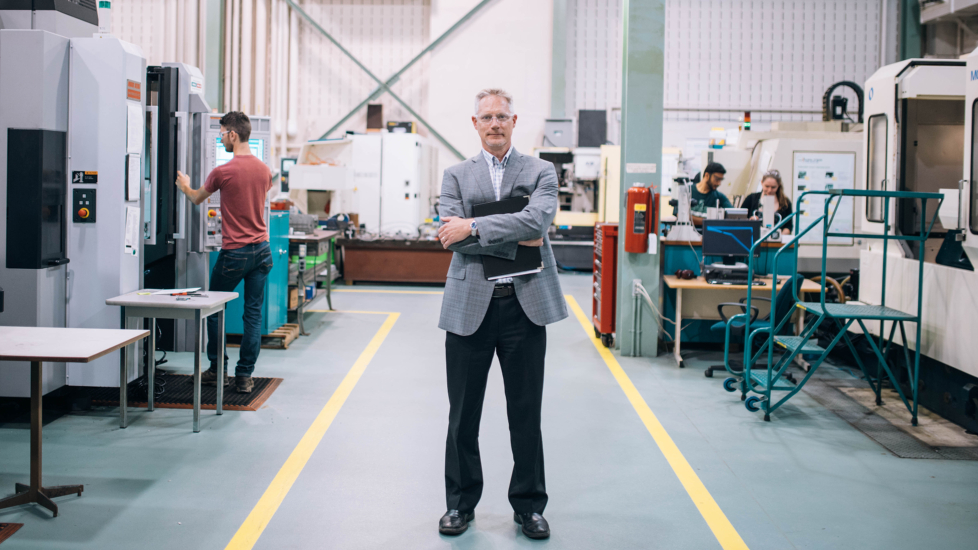 Picture of Stephen Veldhuis standing in McMaster Manufacturing Research Institute