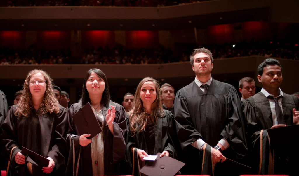 Students in academic robes at McMaster 2018 convocation