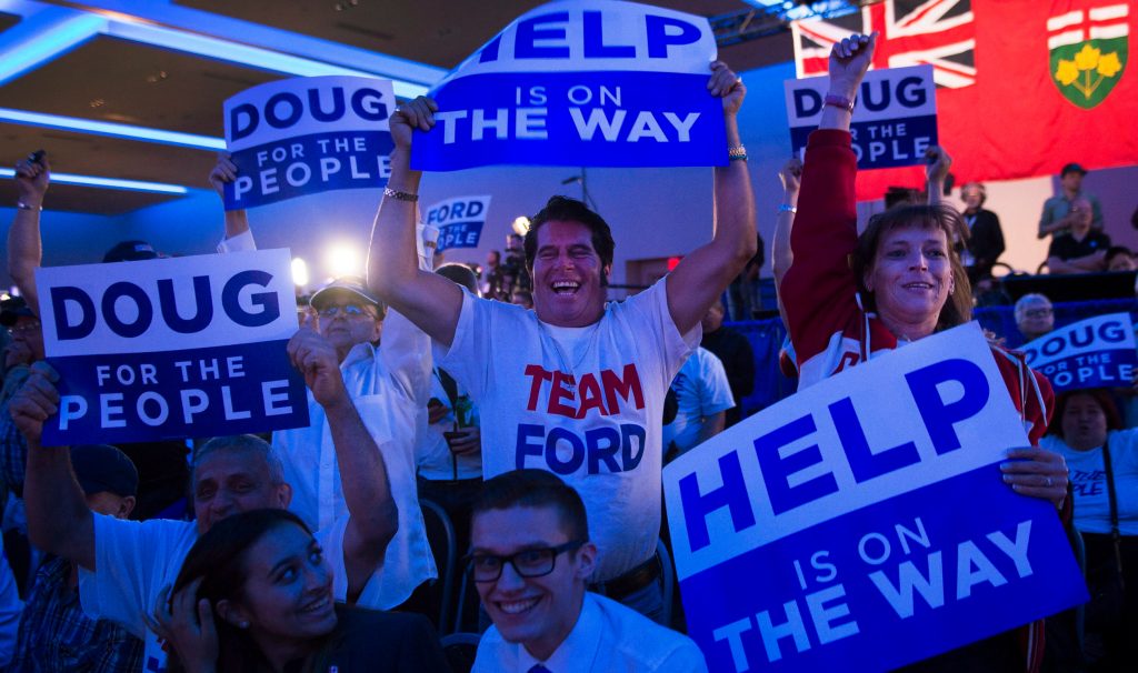 Ontario PC supporters react after Doug Ford was elected premier of Ontario on June 7, 2018. THE CANADIAN PRESS/Nathan Denette