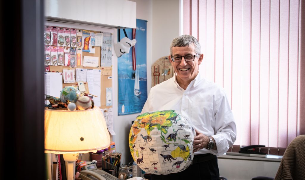 Distinguished Business professor of operations management Mahmut Parlar holds a beach ball in his DeGroote School fo Business office. JD Howell photo