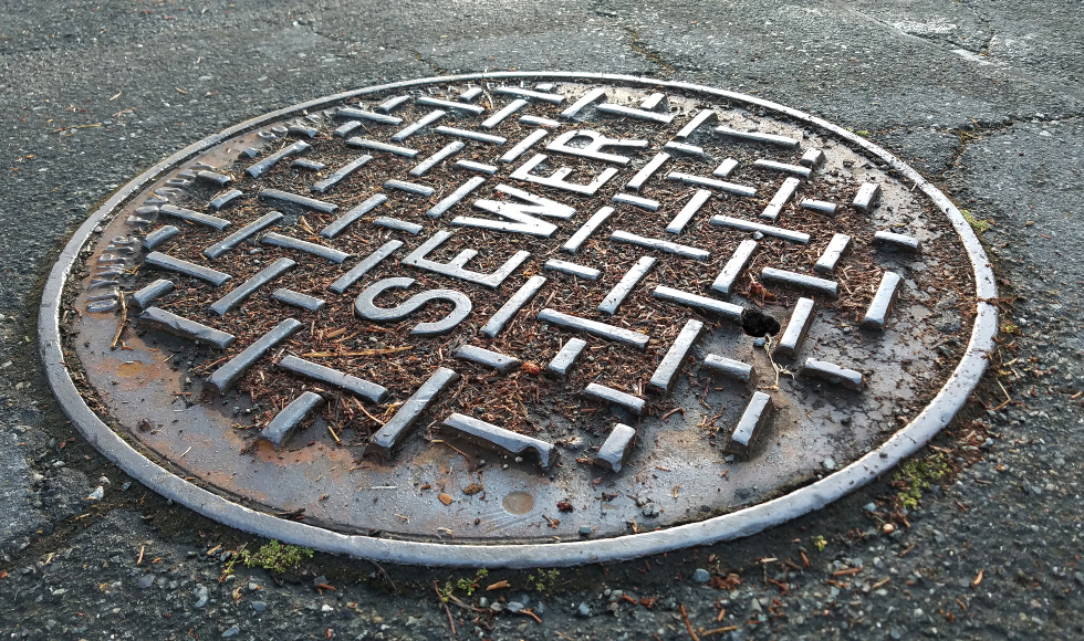 A metal sewer cover