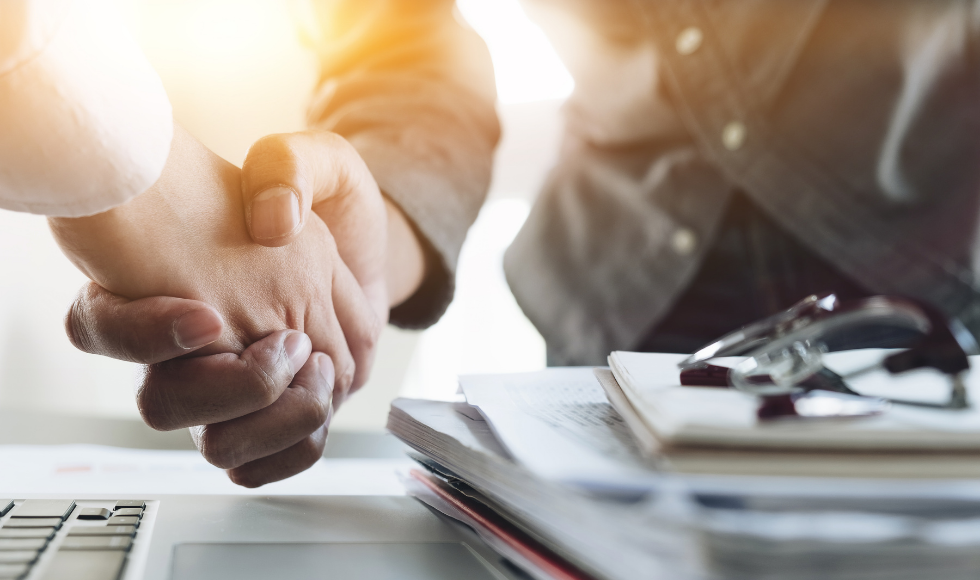 Close up of a handshake