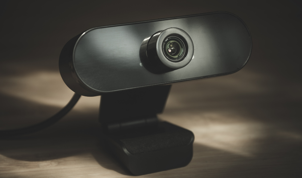 A webcam on a table.