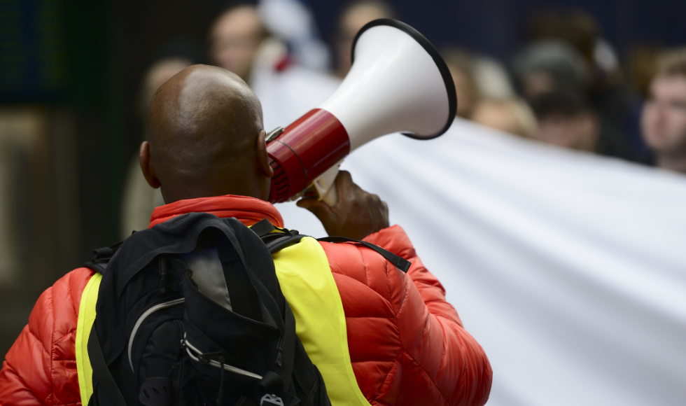 activist with the megaphone during a protest