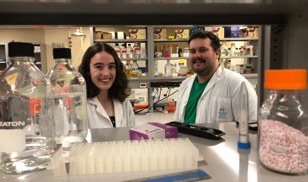 Sierra Vaillancourt and Felix Croteau in the lab