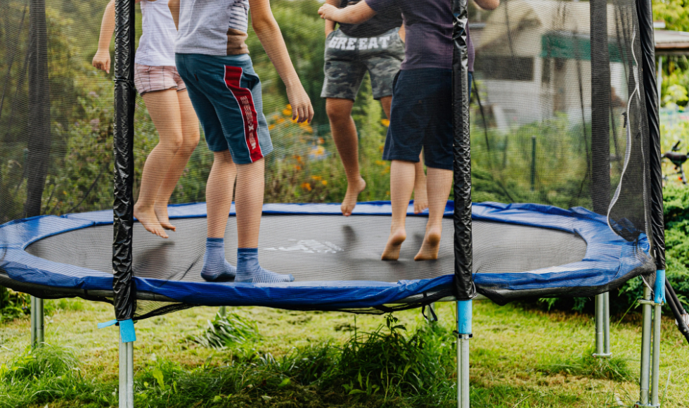 Image of children jumping on a trampoline