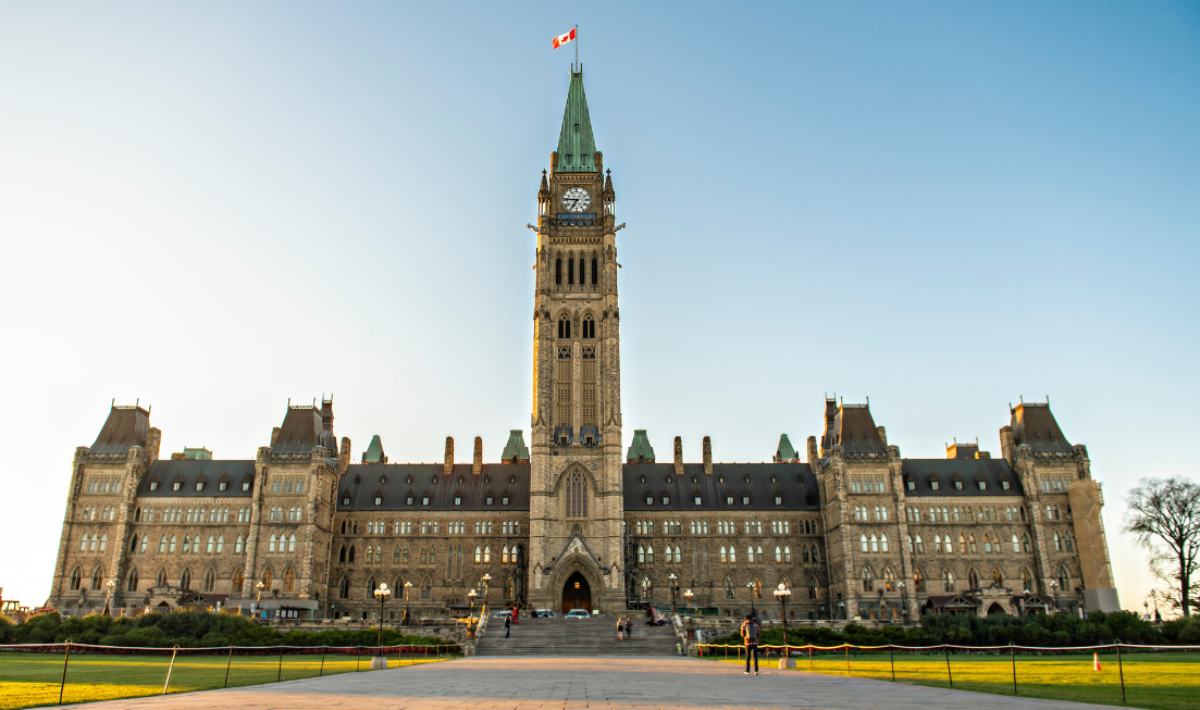 The whole of the Centre Block of Canada's Parliament, seen from a spot in the very centre of the broad walkway that leads to the Peace Tower.