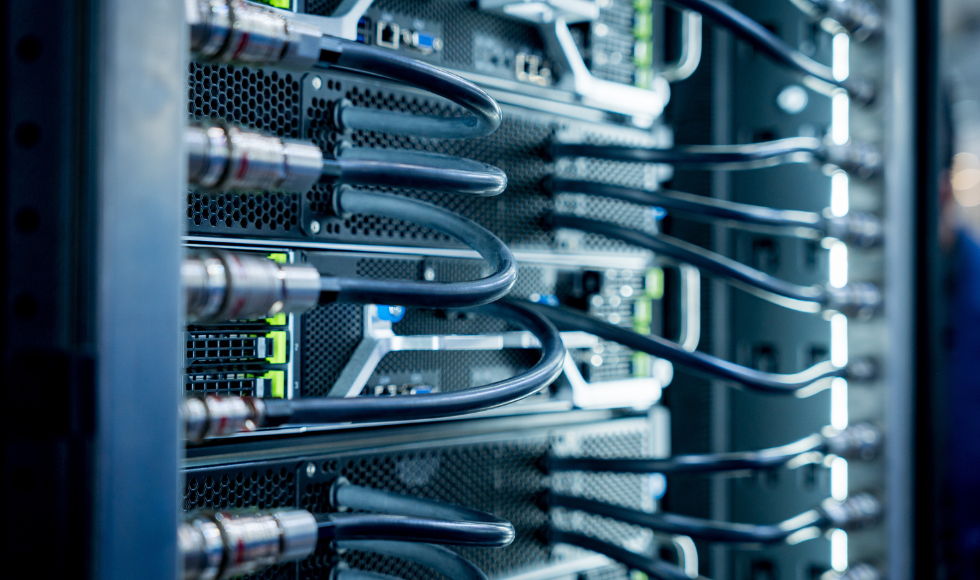 Downloaded Close up of a data center and processing unit with cables and processors.